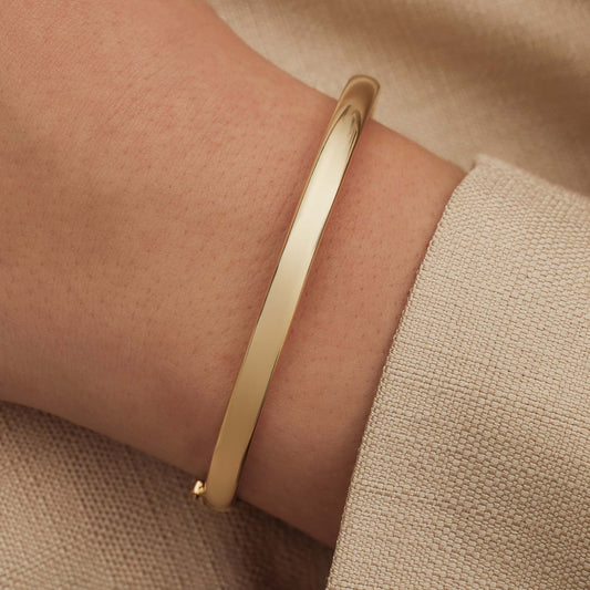 Cour d'Honneur Lucienne 14 karat gold bangle with round edge - - Isabel Bernard