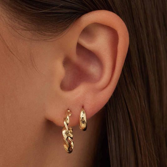 Rivoli Odette 14 karat gold hoop earrings with twist - - Isabel Bernard