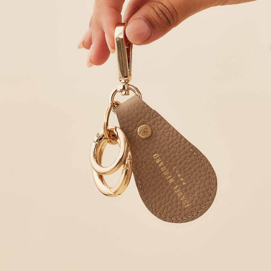 Honoré Filou taupe calfskin leather Airtag key ring - - Isabel Bernard